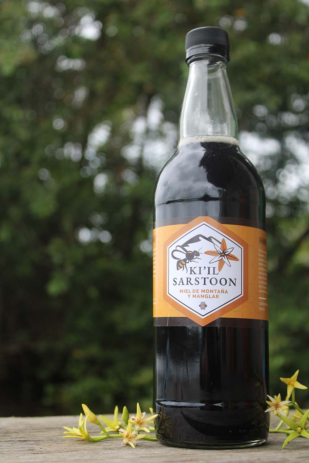 Honey bottle in the foreground